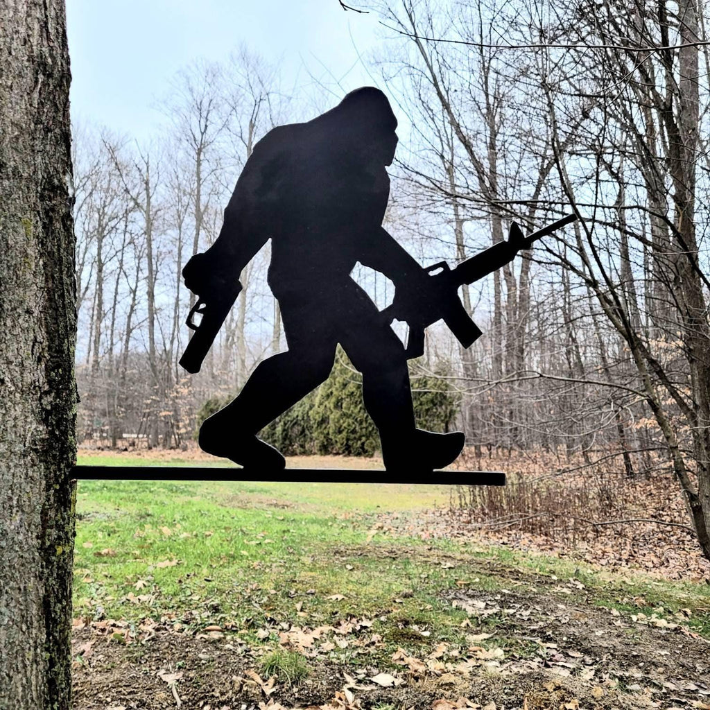 Armed Bigfoot Metal Stake Metal Garden Stake — lifestyle setting