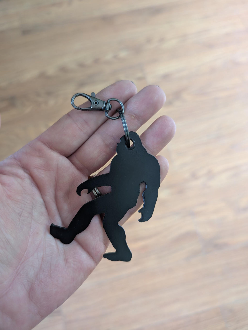 Bigfoot Metal Keychain Metal Keychain — lifestyle setting