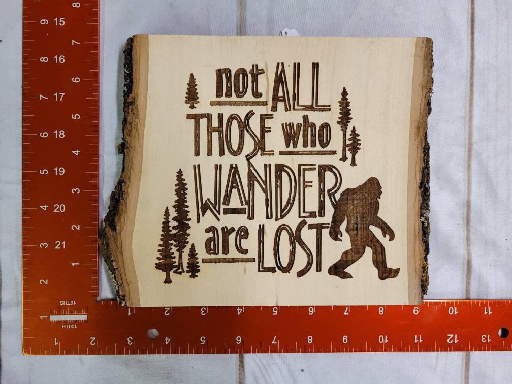 Laser Engraved Bigfoot on Live Edge Basswood  Wood Sign — lifestyle setting