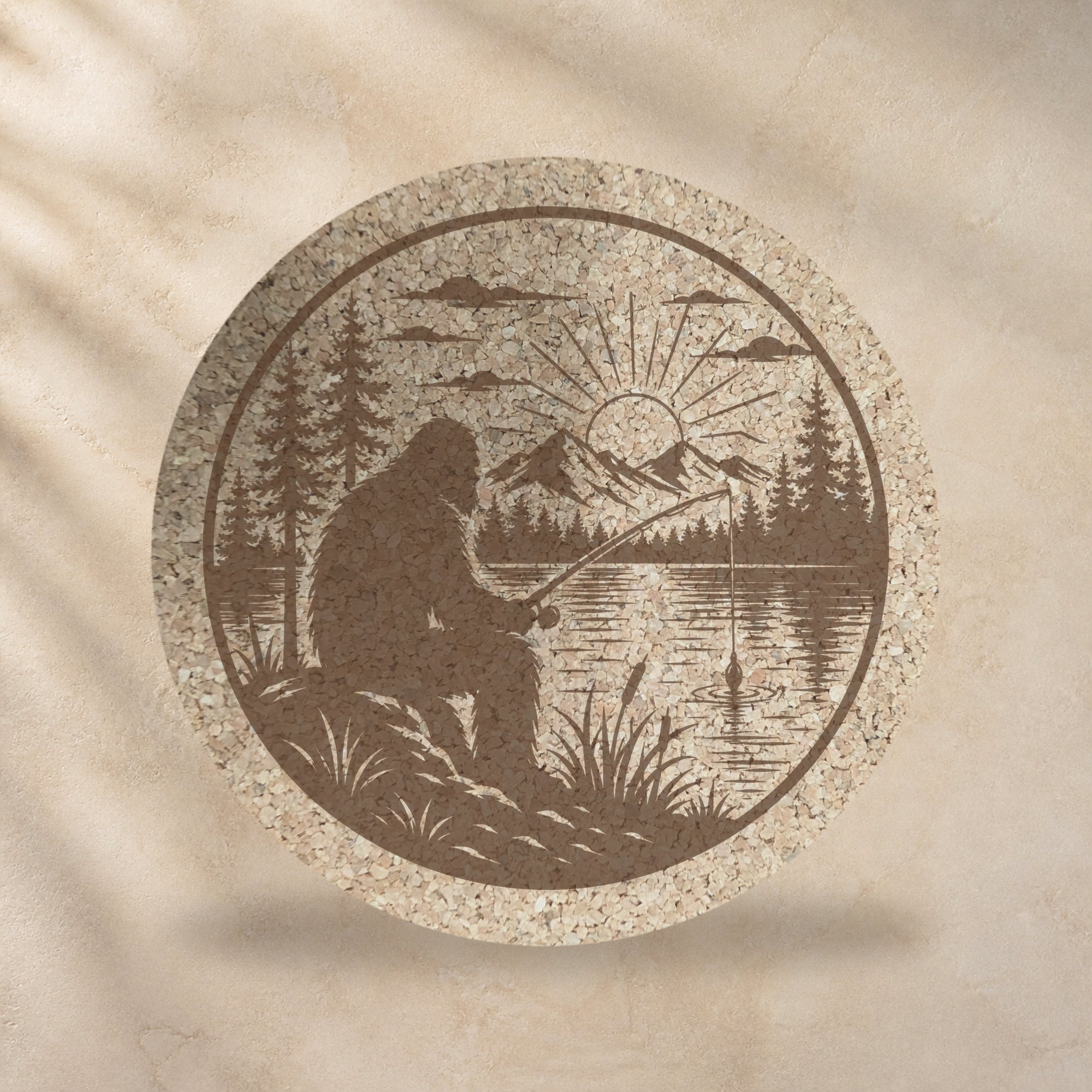 Round cork trivet with Bigfoot fishing at sunrise, sepia lake scene on cork