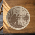 Sunrise Fishing Bigfoot Cork Trivet, Sasquatch Lake Scene Hot Pad, Round Cabin Kitchen Trivet, Fisherman Gift, Made in Ohio