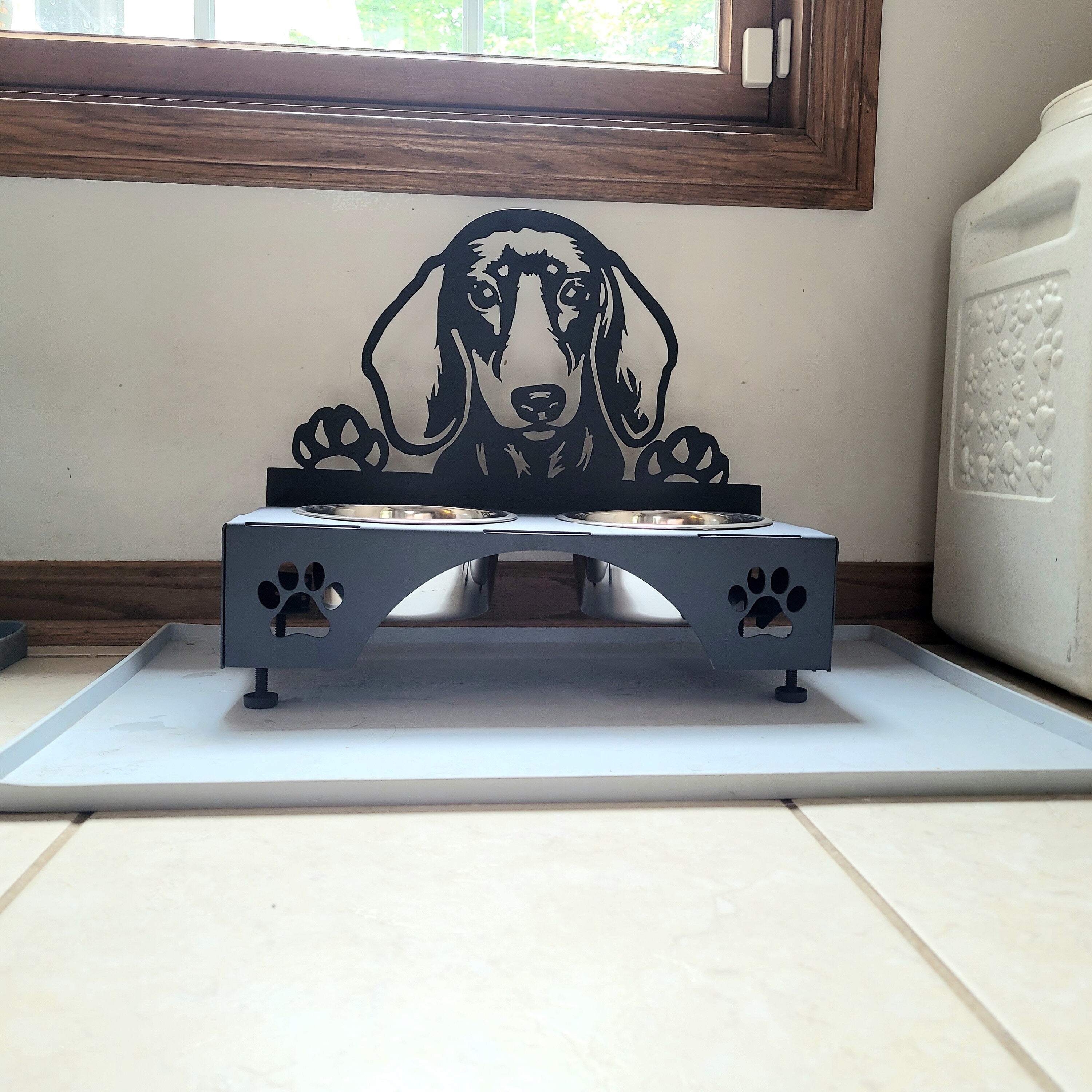 Dachshund Dog Bowl Stand Aluminum Sign — shown on a rustic wall