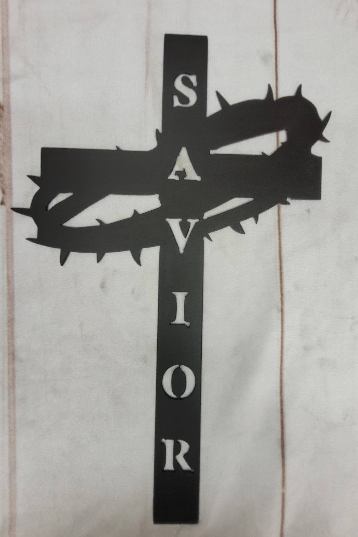 Crucifix Cross Christian Metal Sign Aluminum Sign — shown on a rustic wall