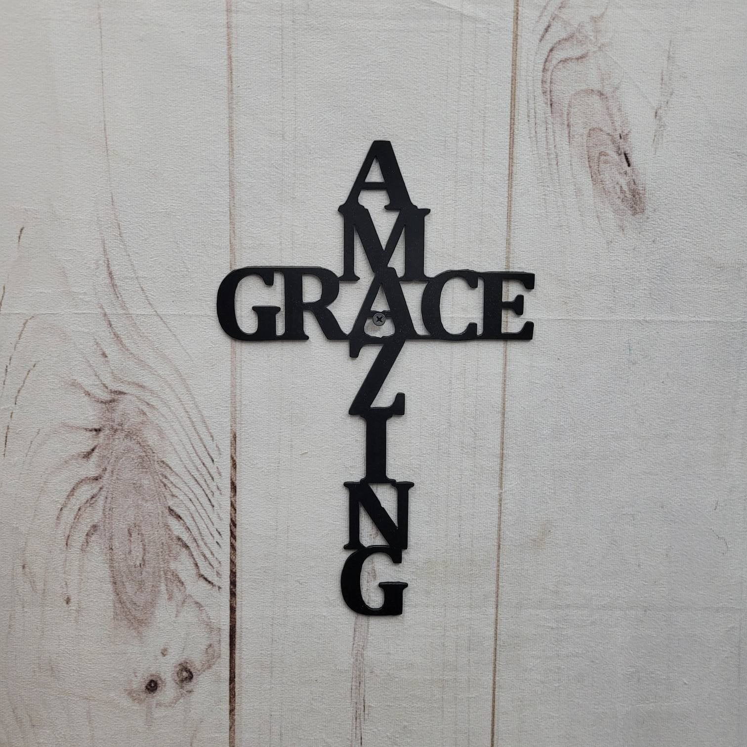 Amazing Grace Cross Christian Metal Sign Aluminum Sign — shown on a rustic wall