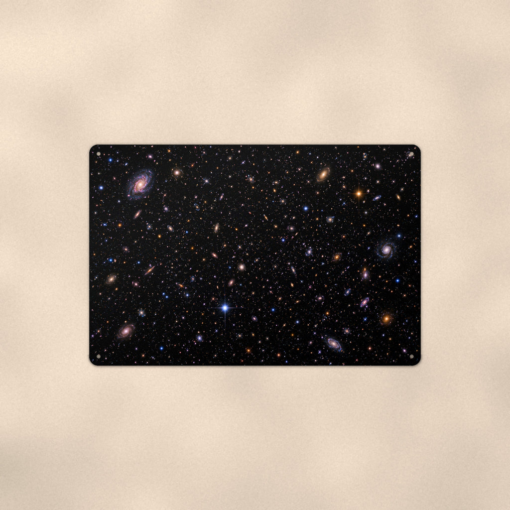 Deep Field Galaxies aluminum metal sign 12" x 8" - front view on warm wall