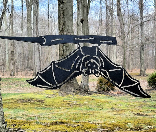 Bat Metal Garden Stake Metal Garden Stake — shown on a rustic wall