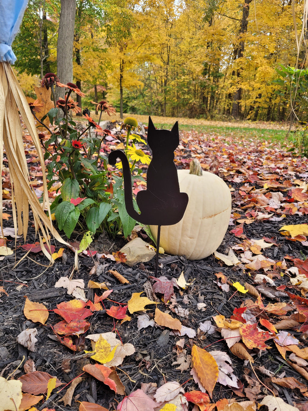 Halloween Black Cat Garden Stake Metal Garden Stake — shown on a rustic wall