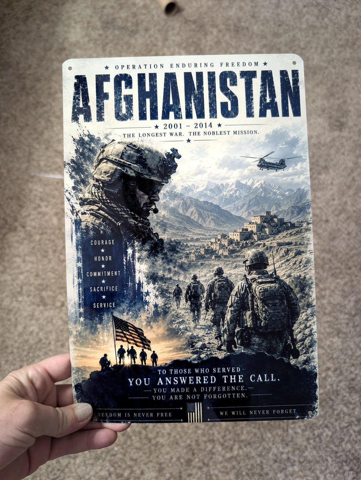 Real photo of the Afghanistan 2001-2014 patriotic aluminum sign held in hand, actual product