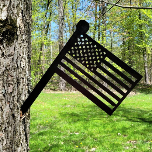 American Flag Metal Garden Stake Metal Garden Stake — shown on a rustic wall