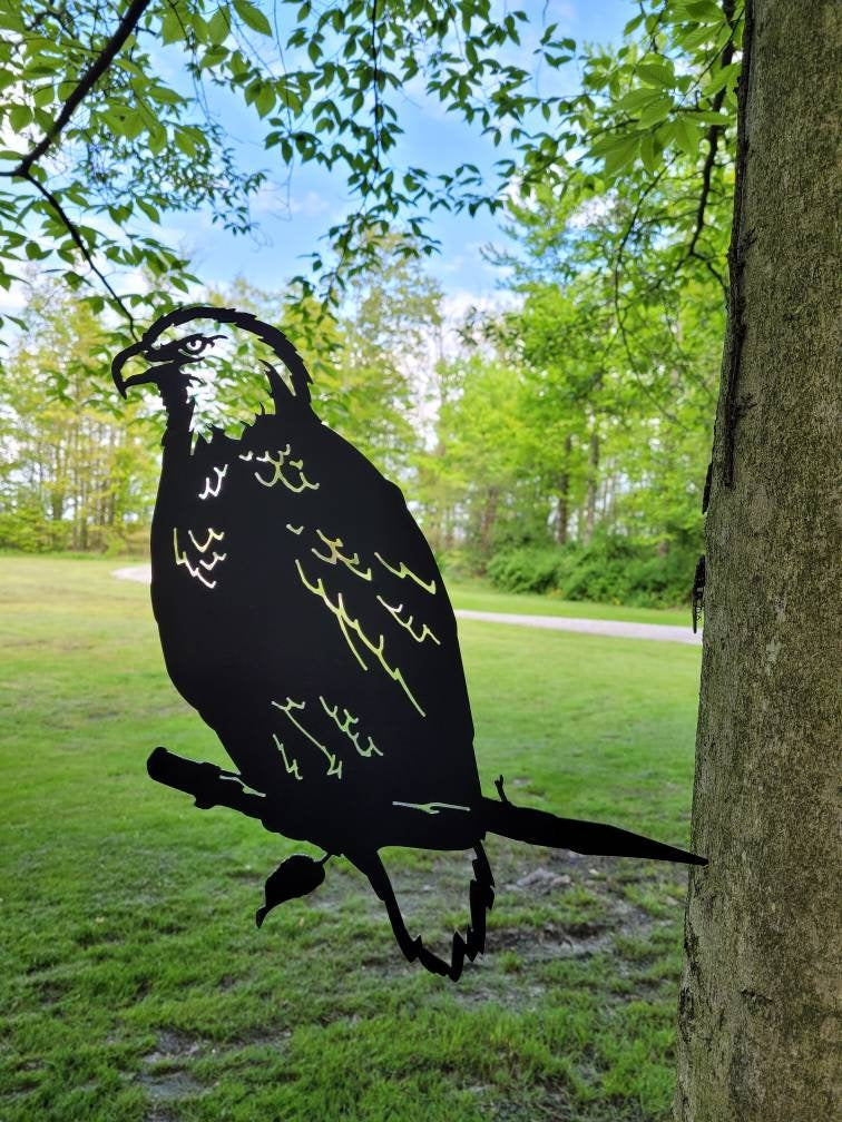 Bald Eagle Metal Garden Stake Metal Garden Stake — shown on a rustic wall