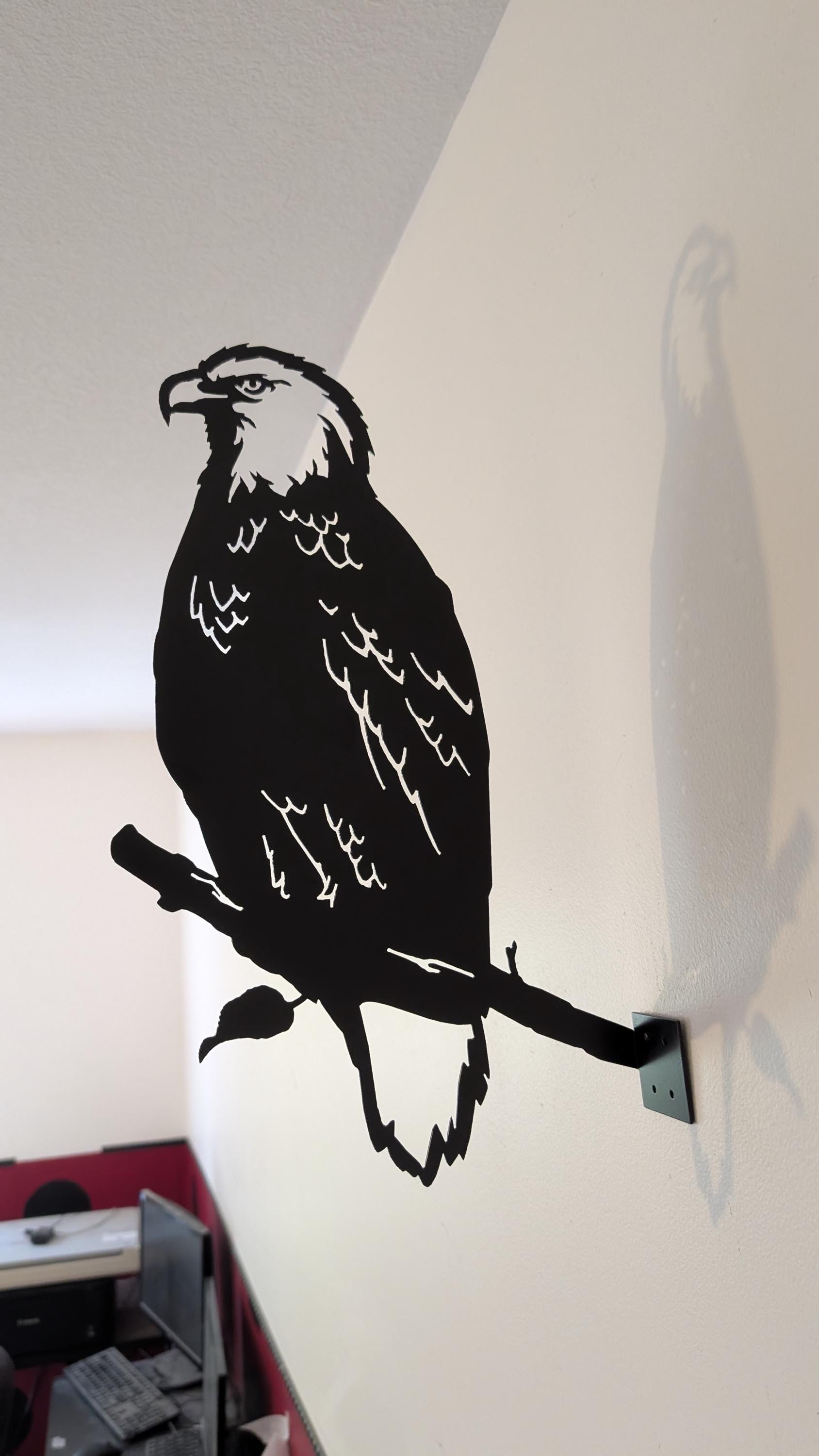Bald Eagle Metal Garden Stake Metal Garden Stake — shown on a rustic wall