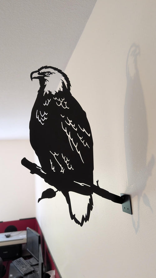 Bald Eagle Metal Garden Stake Metal Garden Stake — shown on a rustic wall