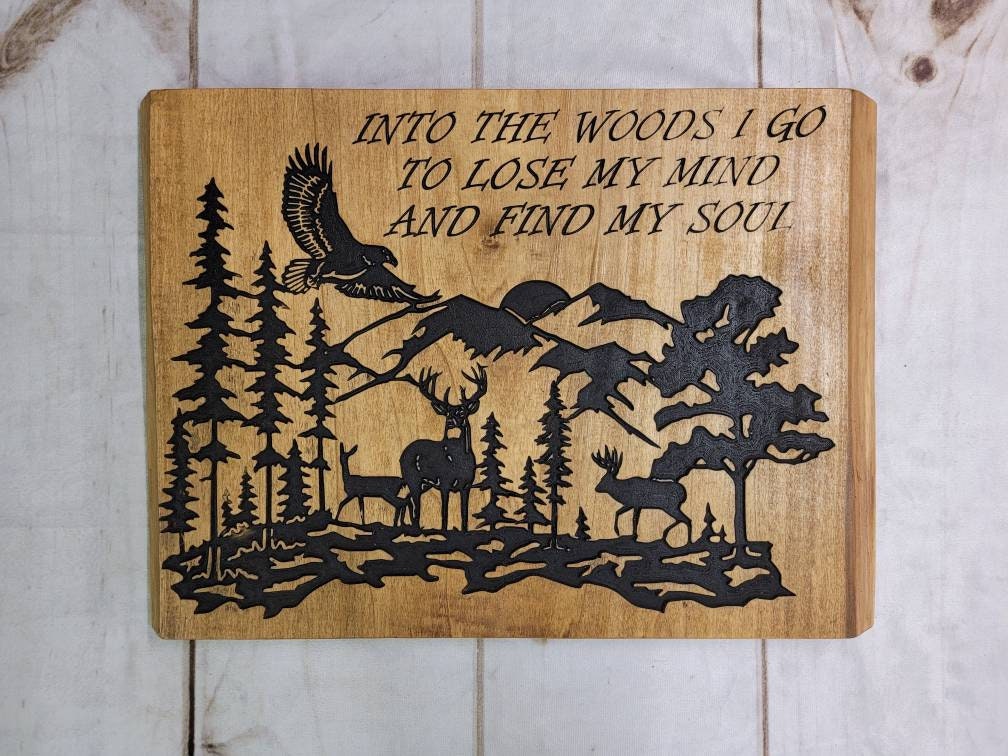 Nature Scene Wood Sign: Carved Deer Wood Sign — shown on a rustic wall