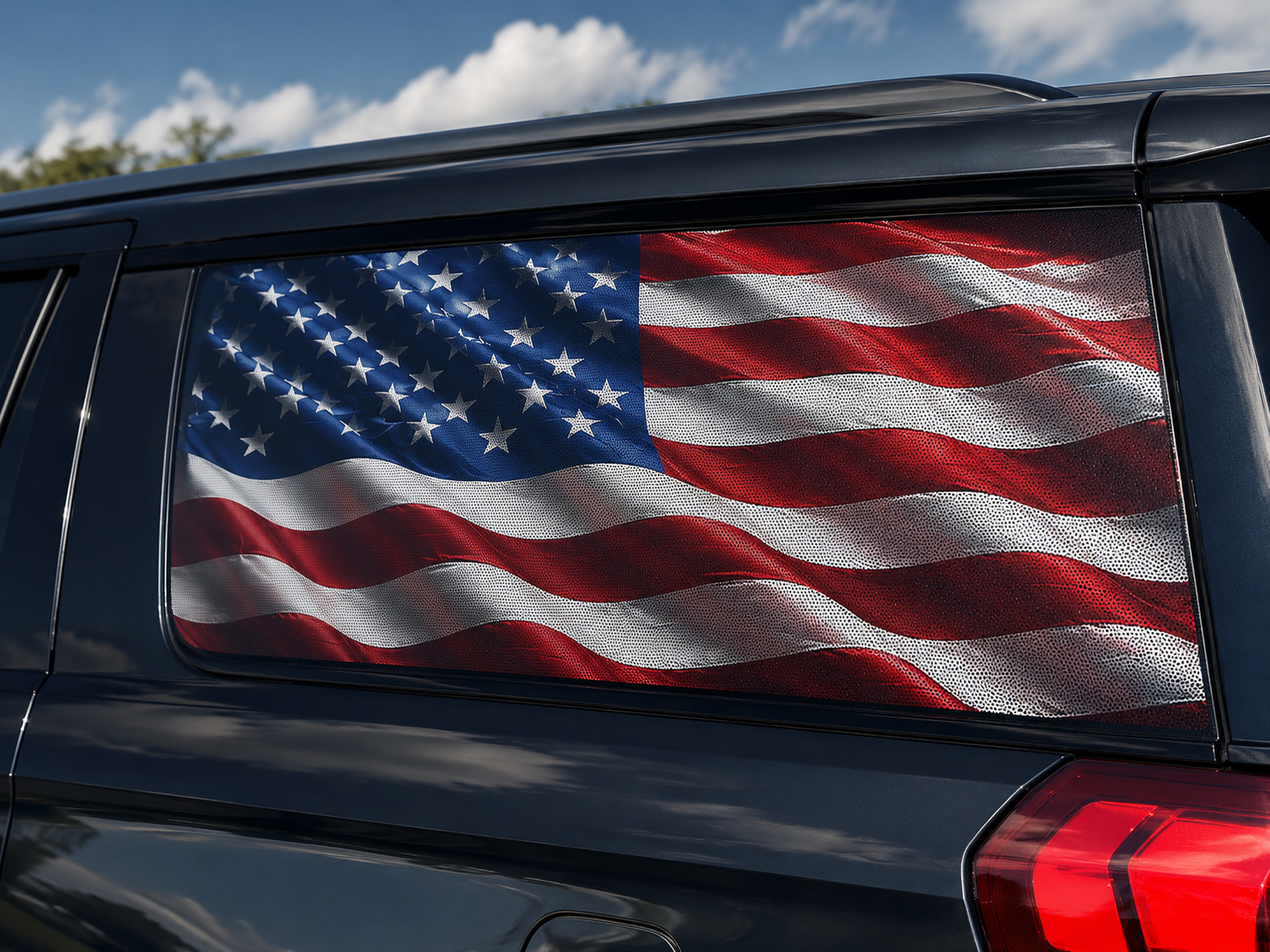 Detail of the perforated flag film on the side window