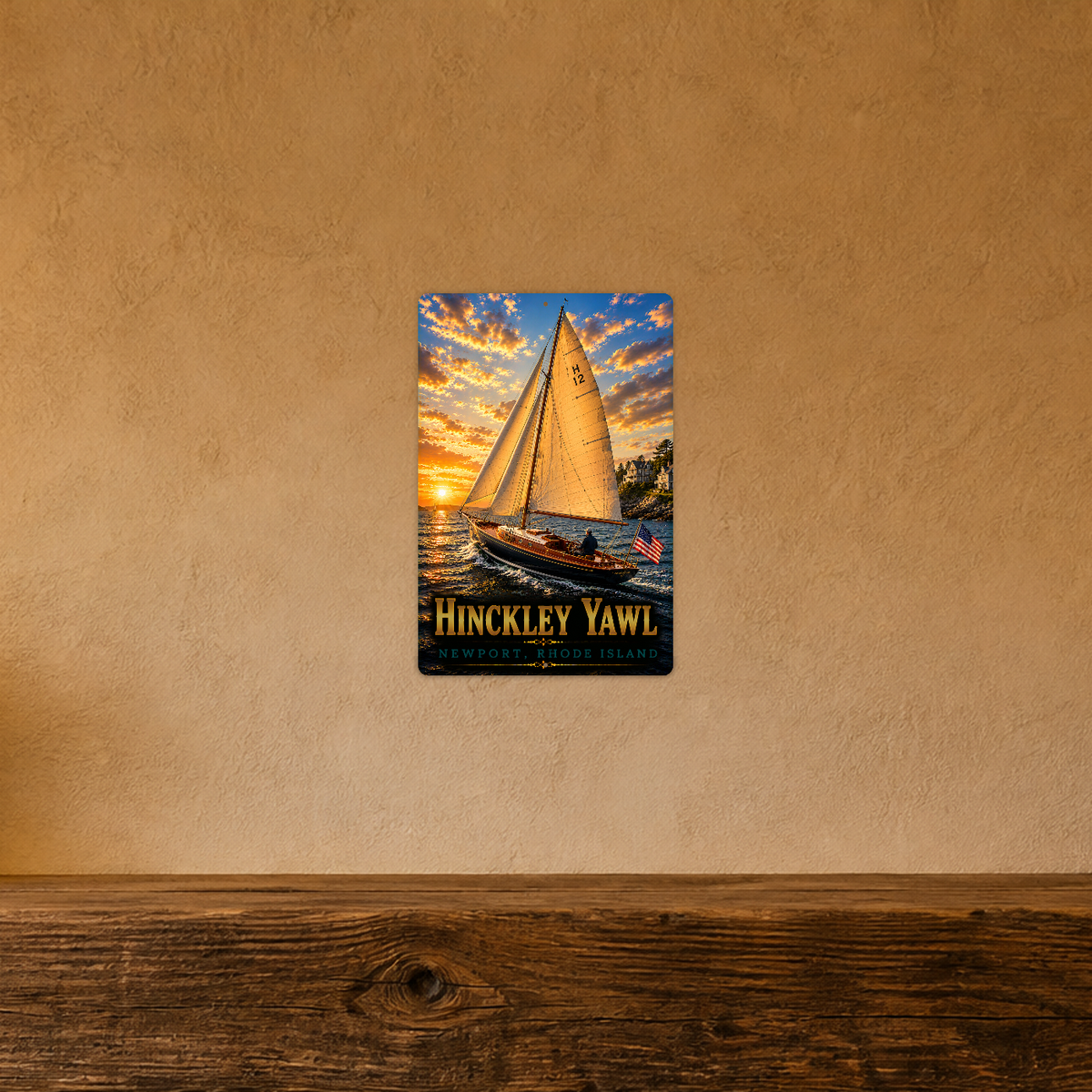 Sign showing Hinckley Yawl Newport lettering and a sailboat with H12 on its golden sail, displayed on a warm tan textured wall above a wooden ledge.
