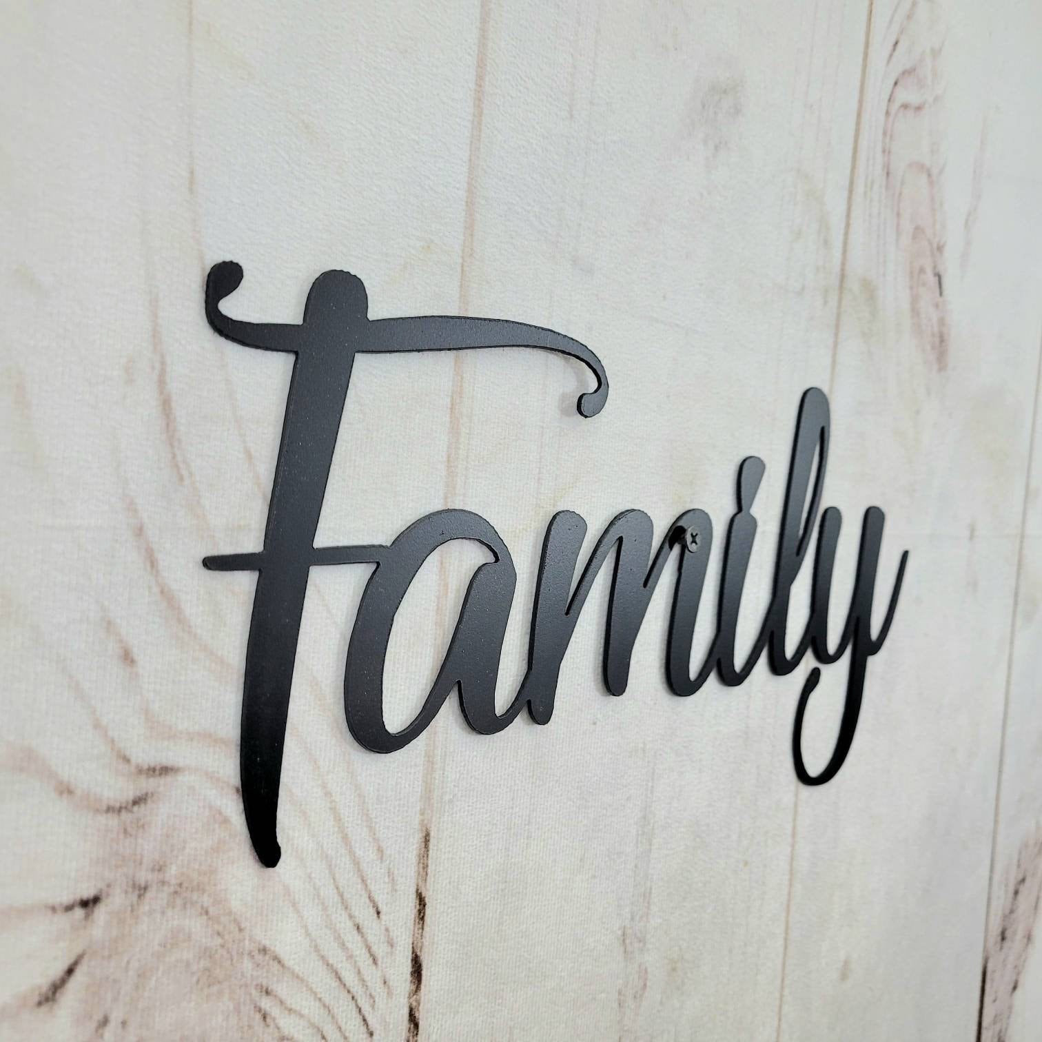 Family Metal Wall Sign Aluminum Sign — shown on a rustic wall