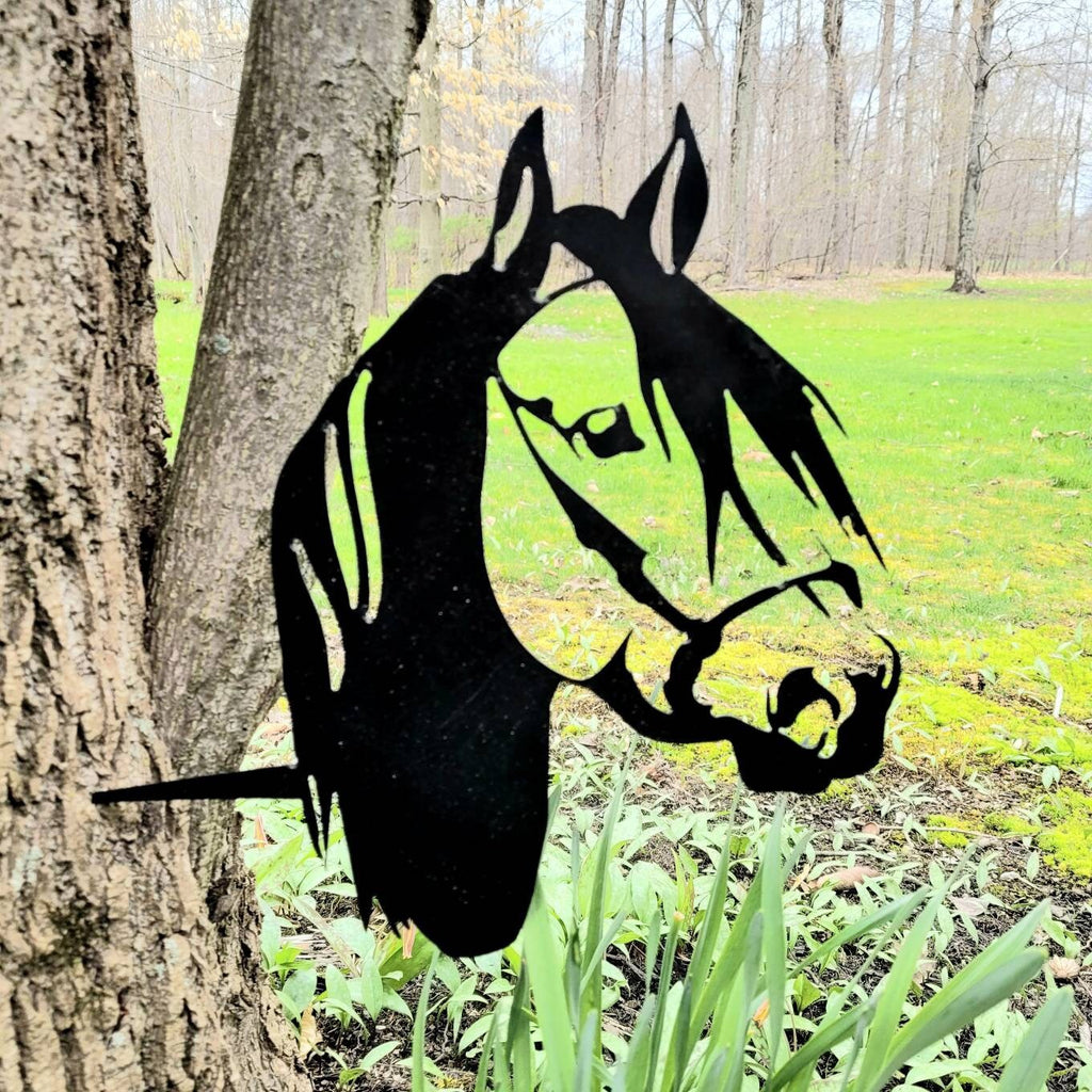 Horse Metal Garden Stake Metal Garden Stake — shown on a rustic wall