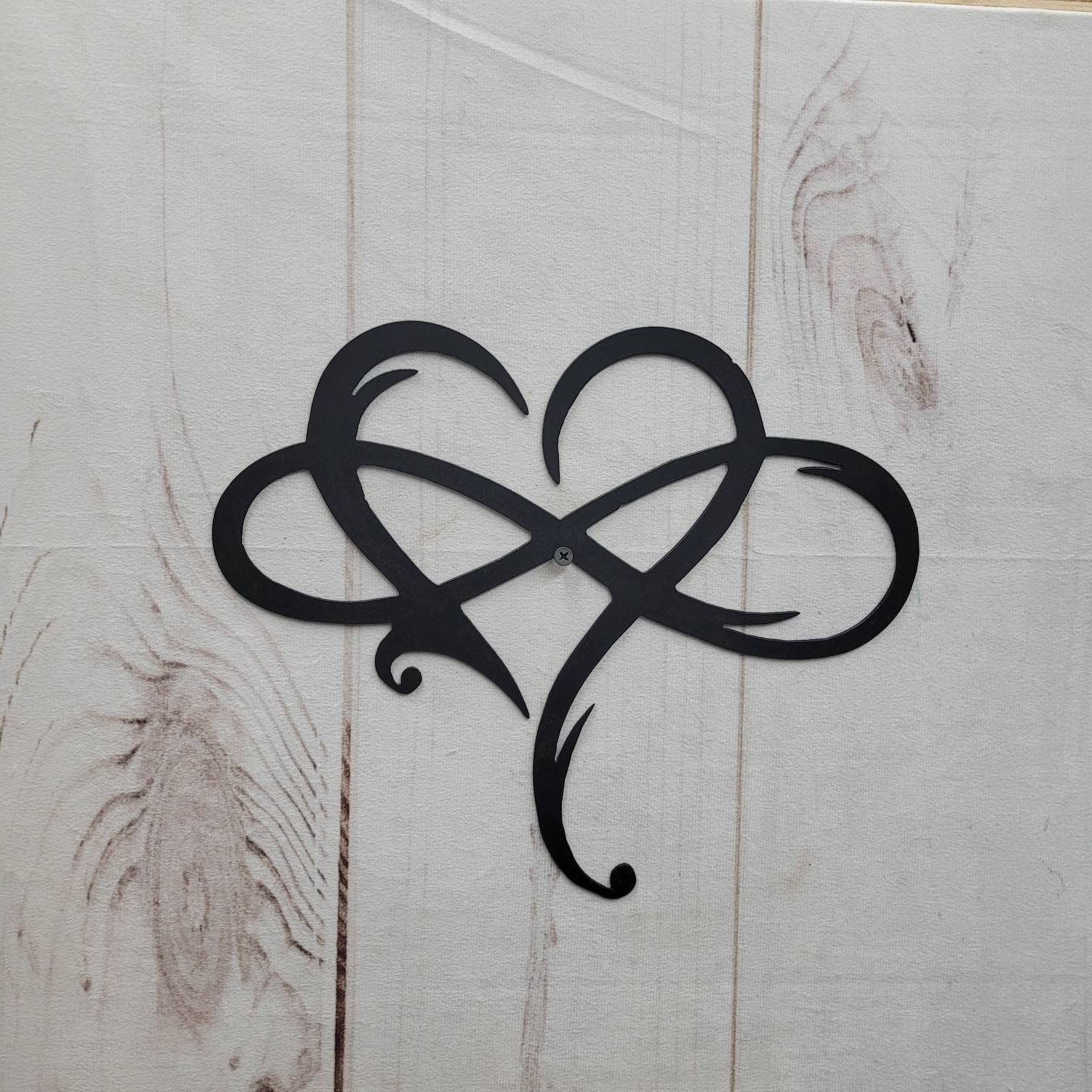 Heart Infinity Metal Wall Sign Aluminum Sign — shown on a rustic wall