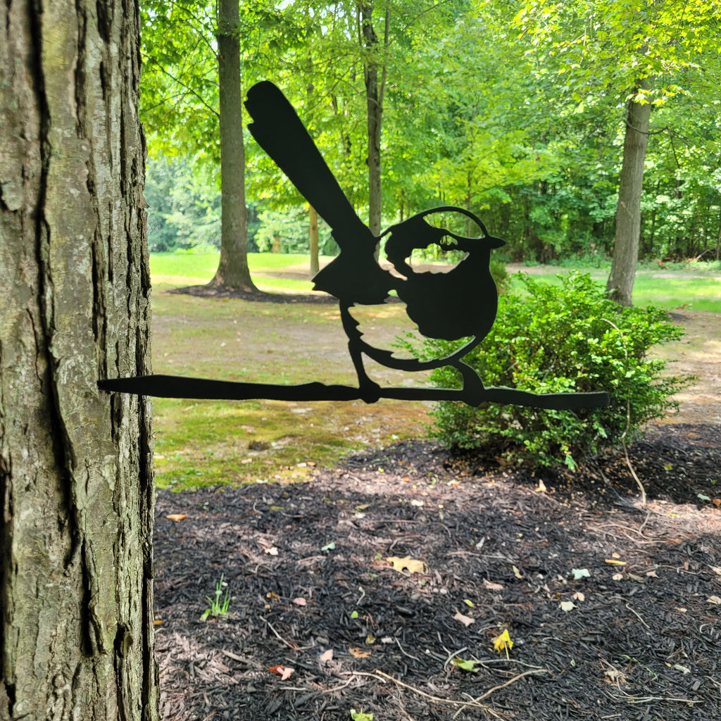 Blue Wren Metal Garden Stake Metal Garden Stake — shown on a rustic wall