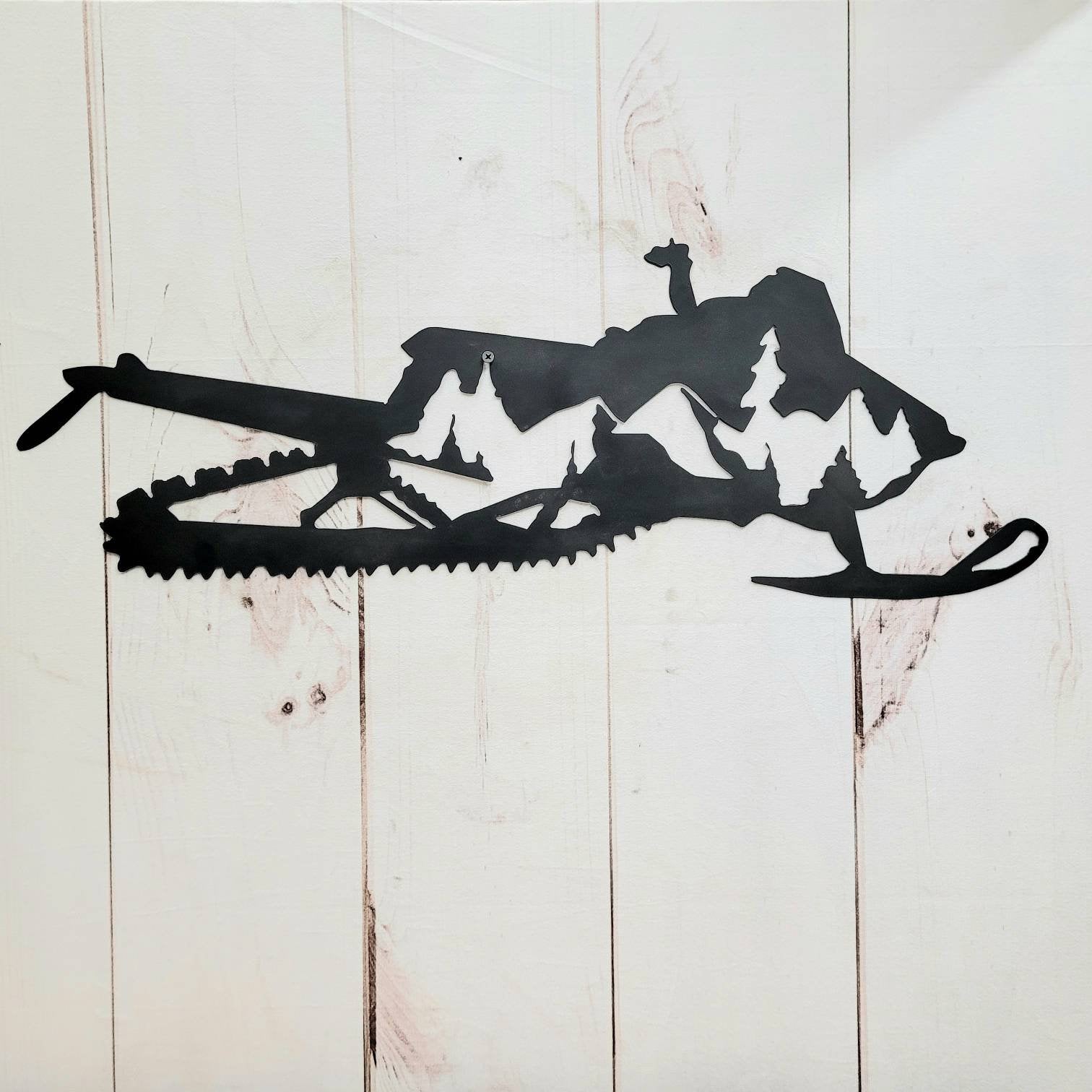 Snowmobile Mountain Metal Wall Art Aluminum Sign — shown on a rustic wall