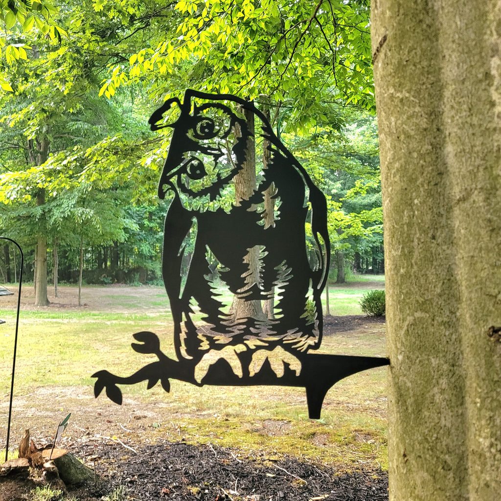 Owl Metal Garden Stake Metal Garden Stake — shown on a rustic wall