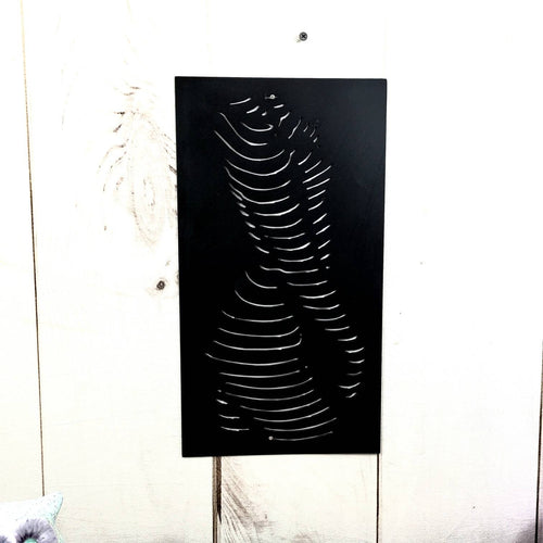 Abstract Female Torso Metal Wall Art Aluminum Sign — shown on a rustic wall