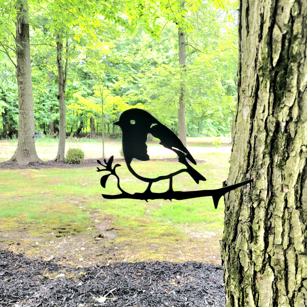 Robin Metal Garden Stake Metal Garden Stake — shown on a rustic wall