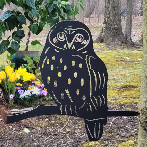 Barn Owl Metal Garden Stake Metal Garden Stake — shown on a rustic wall