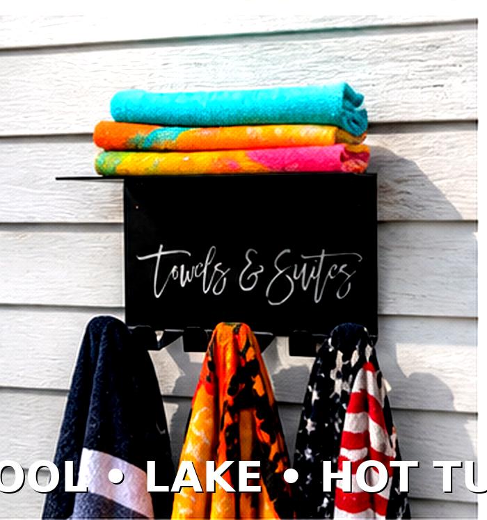 Pool Towel Rack with Shelf Aluminum Sign — shown on a rustic wall