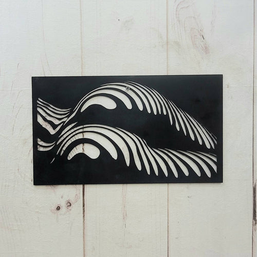 Abstract Female Body Metal Wall Art Aluminum Sign — shown on a rustic wall