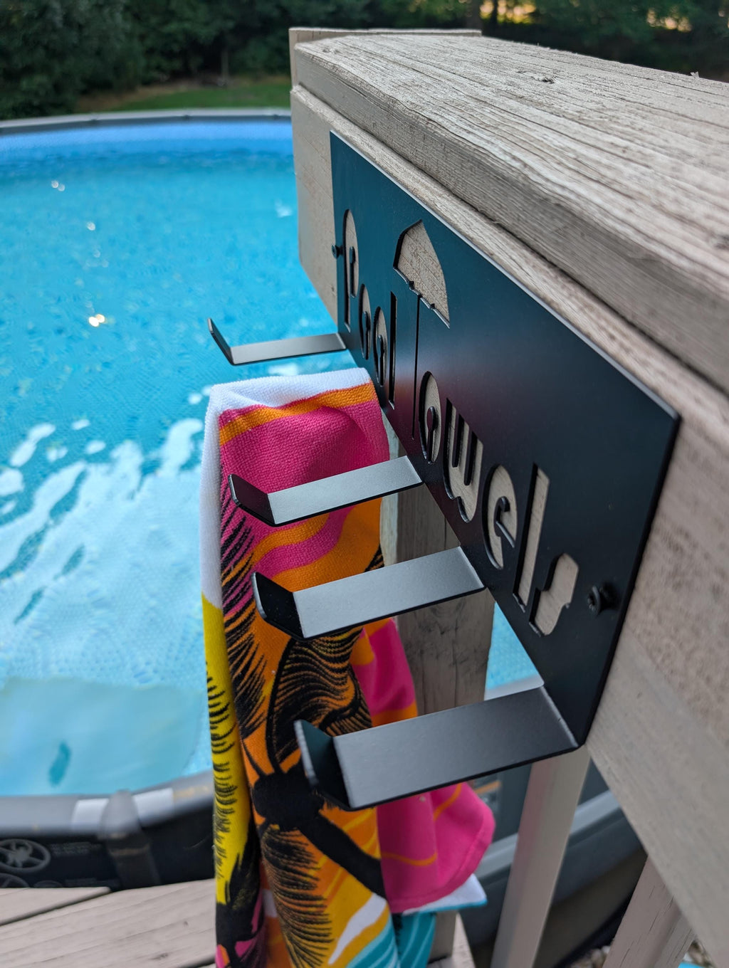 Pool Towel Hanger Aluminum Sign — detail view