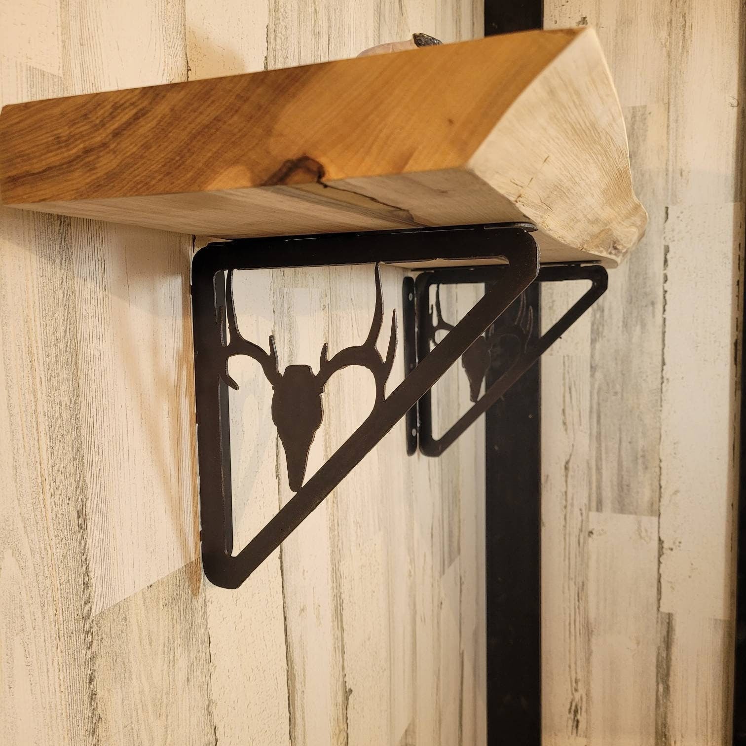 Buck Skull Shelf Bracket Metal Shelf Bracket — front view on white background