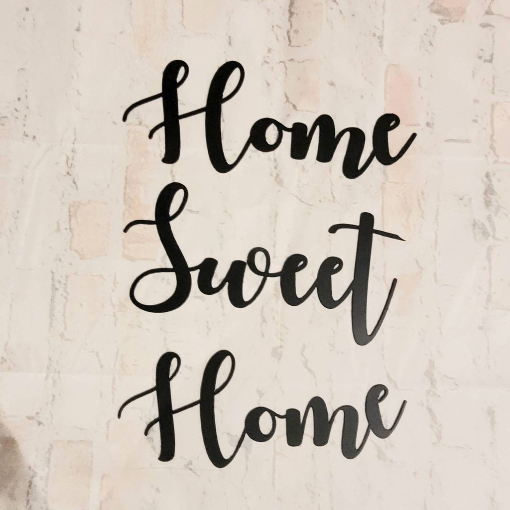 Home Sweet Home Metal Sign Aluminum Sign — shown on a rustic wall