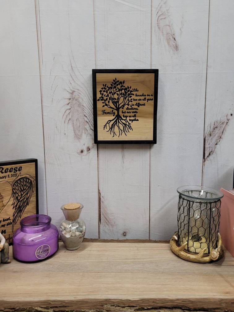 Family tree solid wood carved wall hanging ho Wood Sign — shown on a rustic wall