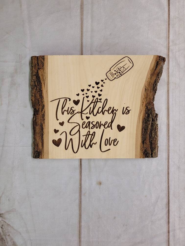 Laser Engraved Basswood Kitchen Wall Art Wood Sign — shown on a rustic wall