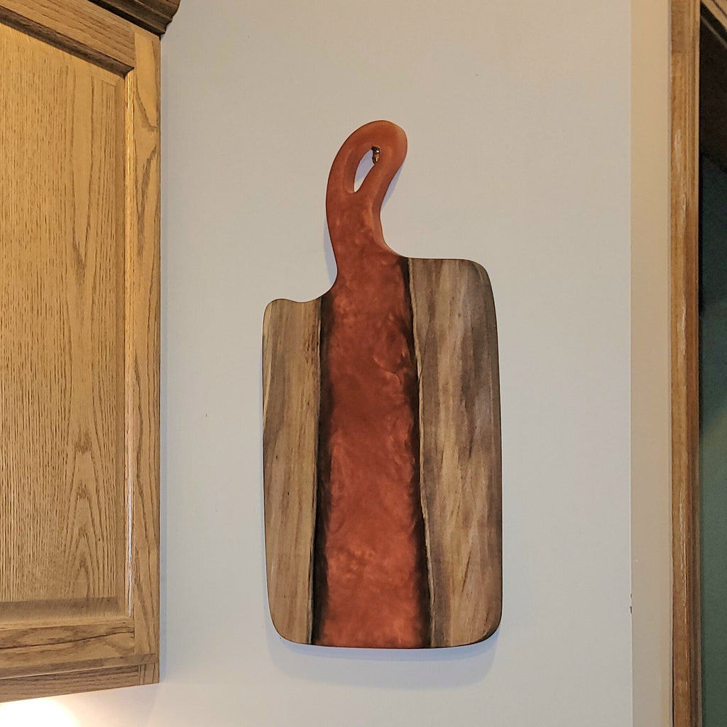 Live Edge Walnut Charcuterie Board Wood Sign — shown on a rustic wall