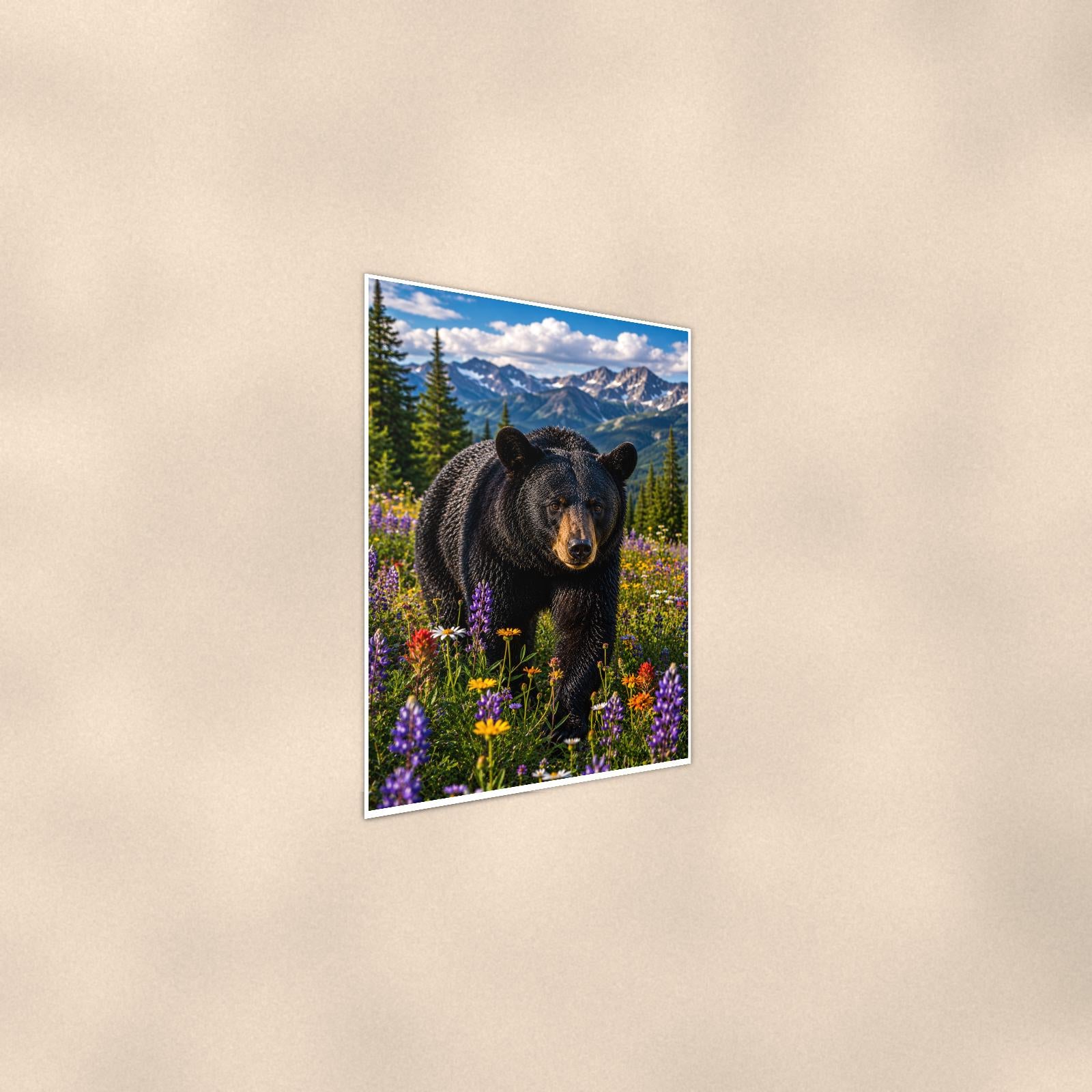 Meadow Wander Bear — 24x36 in art print poster, premium luster paper with a white border; steeper three-quarter angle on a warm wall, catching the luster sheen.