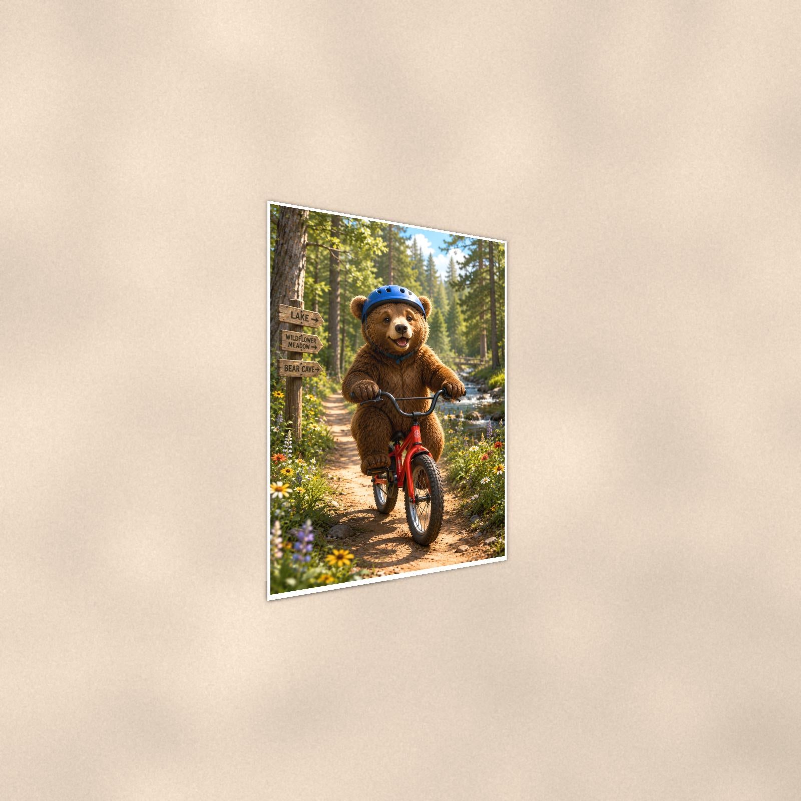 Bicycle Ride Bear — 24x36 in art print poster, premium luster paper with a white border; steeper three-quarter angle on a warm wall, catching the luster sheen.