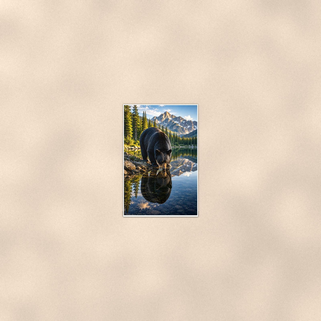 Lake Reflection Bear — 24x36 in art print poster, premium luster paper with a white border; poster seen from further back, at true 24x36 in scale on a warm wall.
