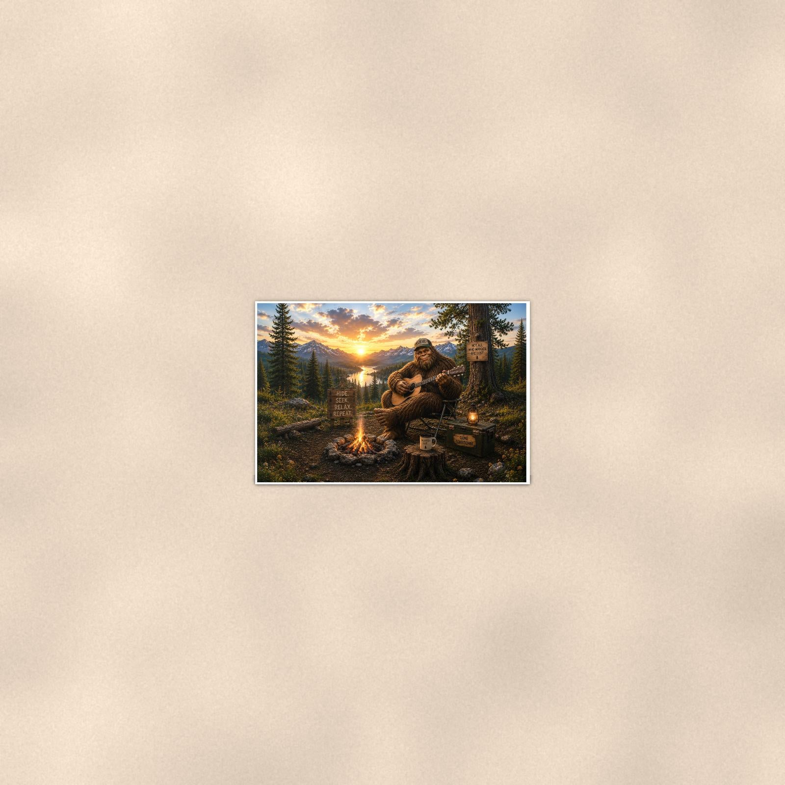 Campfire Guitar Bigfoot — 36x24 in art print poster, premium luster paper with a white border; poster seen from further back, at true 24x36 in scale on a warm wall.