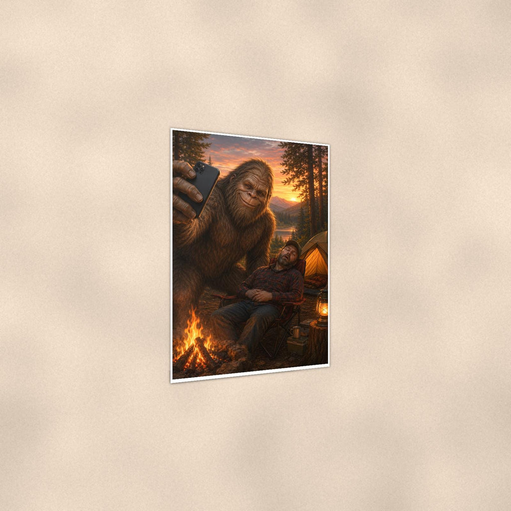 Selfie Bigfoot — 24x36 in art print poster, premium luster paper with a white border; gentle three-quarter angle on a warm wall, showing the flat paper edge.