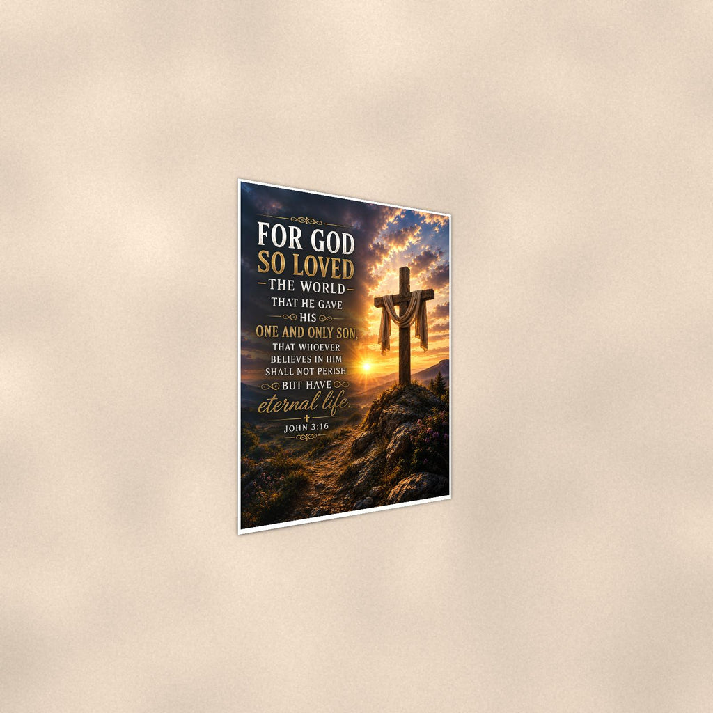For God So Loved The World — 24x36 in art print poster, premium luster paper with a white border; steeper three-quarter angle on a warm wall, catching the luster sheen.