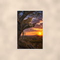 Leopard Tree Sunset — 24x36 in art print poster, premium luster paper with a white border; poster shown straight on against a warm wall.