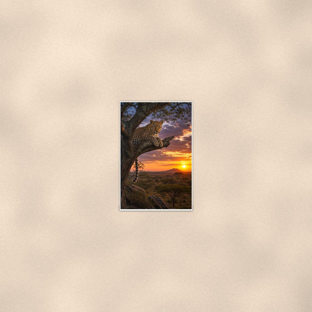 Leopard Tree Sunset — 24x36 in art print poster, premium luster paper with a white border; poster seen from further back, at true 24x36 in scale on a warm wall.