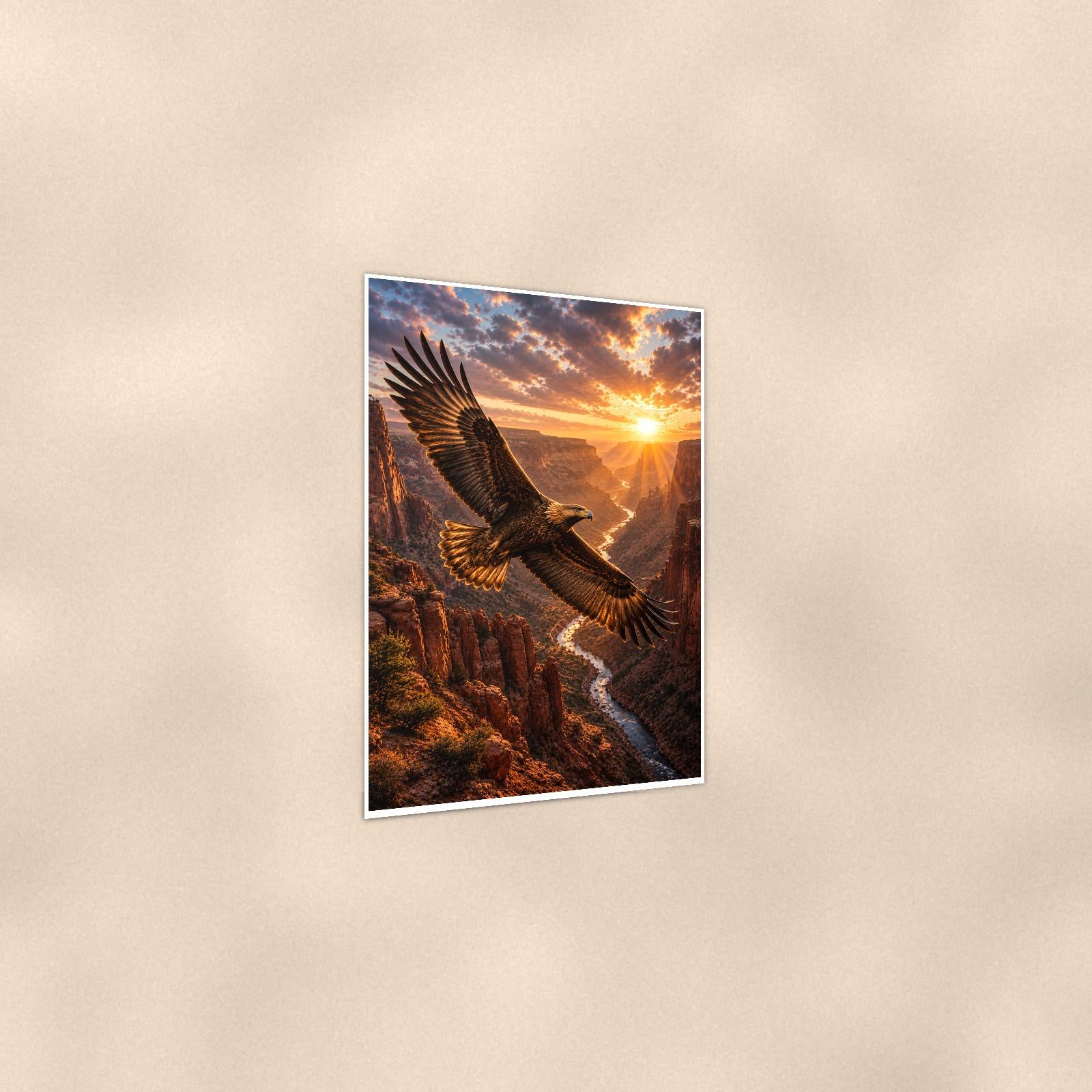 Canyon Eagle Sunset — 24x36 in art print poster, premium luster paper with a white border; gentle three-quarter angle on a warm wall, showing the flat paper edge.