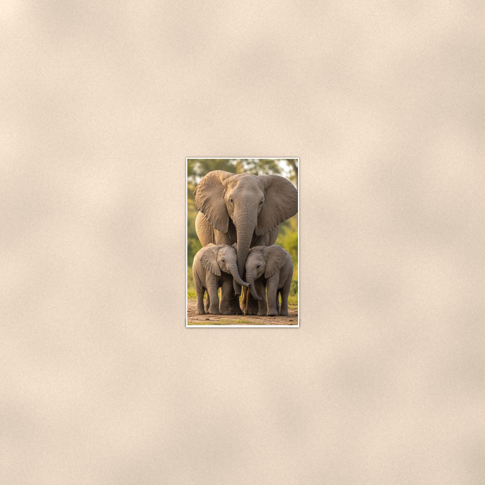 Elephant Family — 24x36 in art print poster, premium luster paper with a white border; poster seen from further back, at true 24x36 in scale on a warm wall.