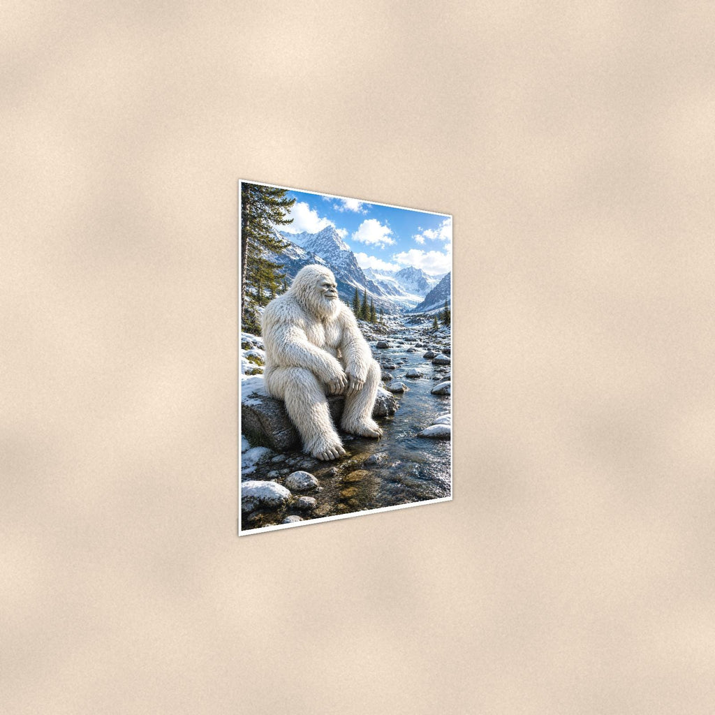 Mountain Stream Yeti — 24x36 in art print poster, premium luster paper with a white border; steeper three-quarter angle on a warm wall, catching the luster sheen.