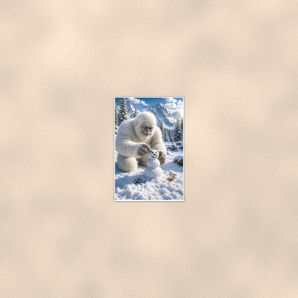Snowman Builder Yeti — 24x36 in art print poster, premium luster paper with a white border; poster seen from further back, at true 24x36 in scale on a warm wall.