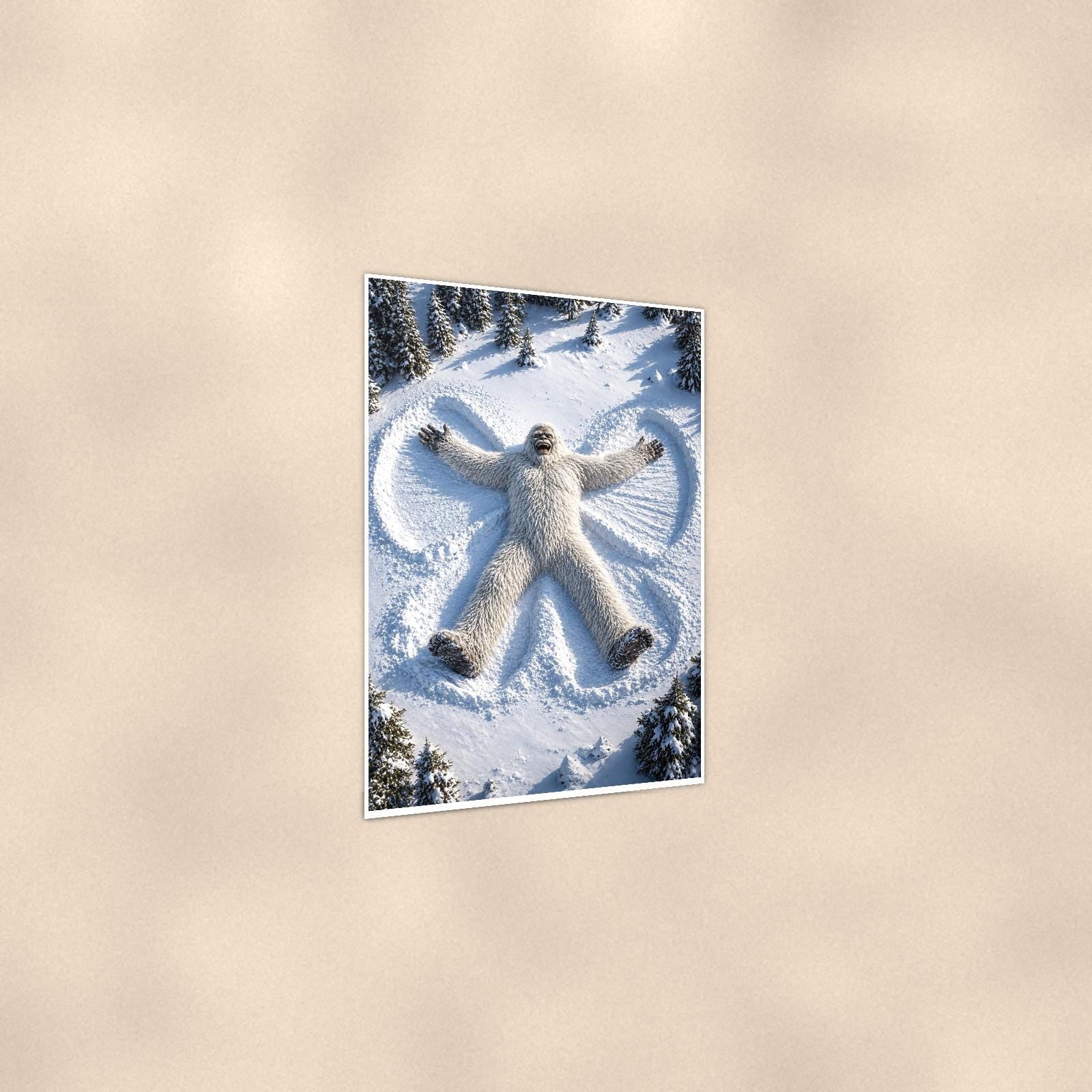 Snow Angel Yeti — 24x36 in art print poster, premium luster paper with a white border; gentle three-quarter angle on a warm wall, showing the flat paper edge.