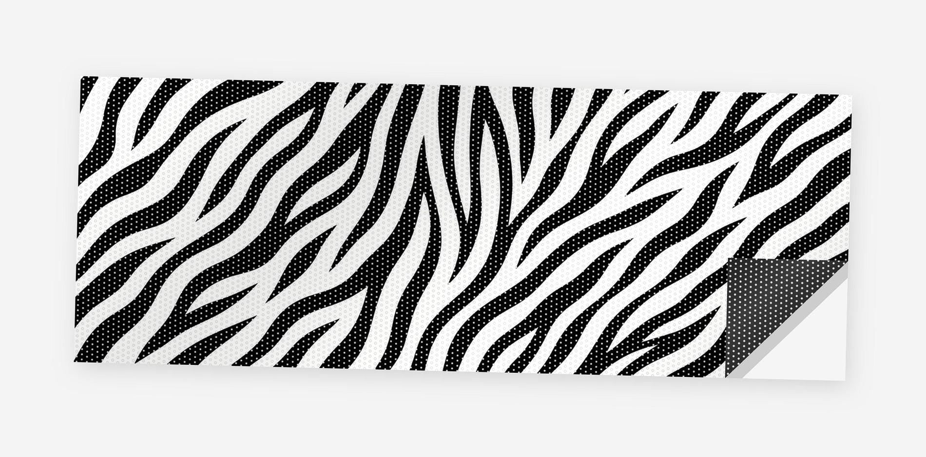 Zebra Print 68 x 18.5 inch perforated vinyl truck decal printed flat on white, corner folded up showing the perforation pattern and liner